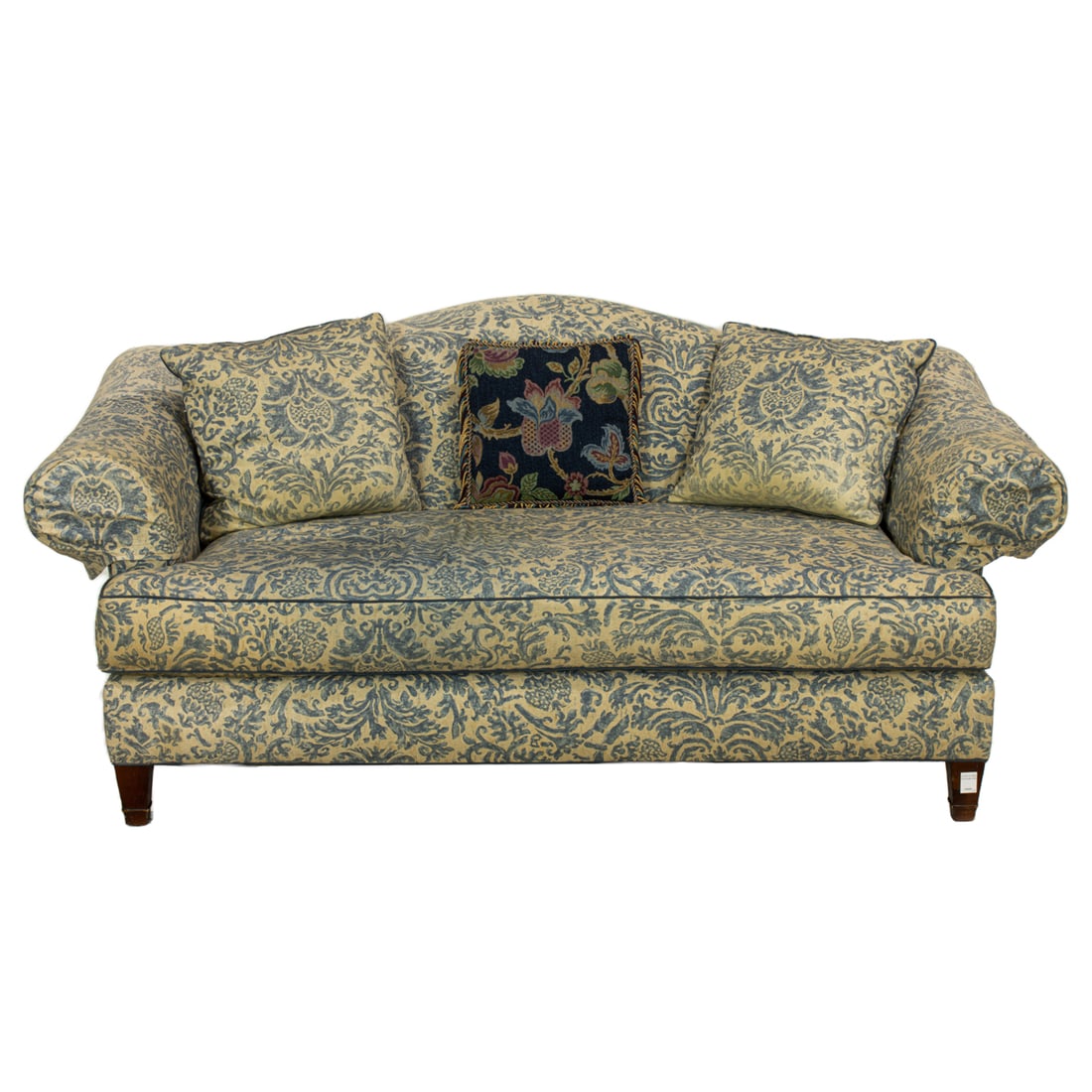 A Ralph Lauren for Henredon sofa: A Ralph Lauren for Henredon sofa, fashioned in the contemporary Chippendale taste, the camelback form with downscrolling arms, the single down cushion upholstered in a blue printed floral upholstery,