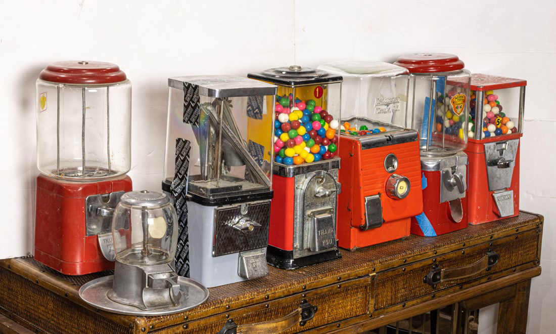 Three gumball machines with nickel dispensers: Three gumball machines with nickel dispensers, including Northwestern; Abbey Manufacturing Company and Oak Manufactuing Company, largest 16"h