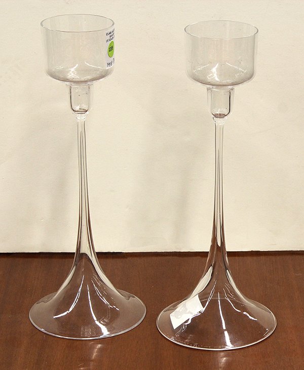 Orrefors candlesticks: (lot of 2) Nils Landberg for Orrefors, Sweden, crystal candlesticks, each having a graduated bowl rising on a trumpet standard terminating on a circular base marked and numbered, 14.5''h