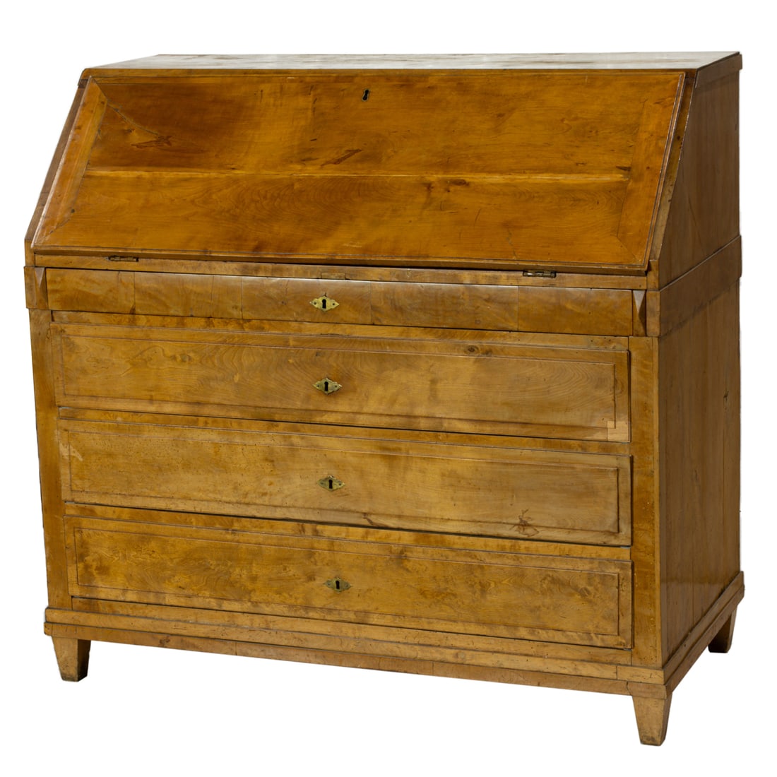 A Swedish Biedermeier slant front desk: A Swedish Biedermeier slant front desk, the slant door opening to reveal an interior compartmentalized with crossbanded drawers with bone handles, over a short drawer and three long drawers, 45"h x 47