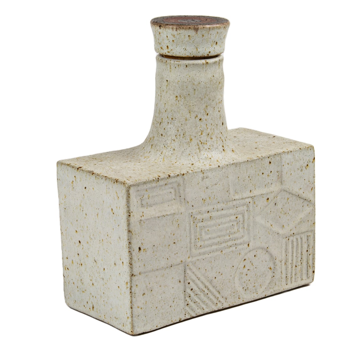 A Bruno Gambone glazed stoneware covered bottle: A Bruno Gambone glazed stoneware covered bottle, Italy, circa 1970, of rectangular section with geometric relief design and circular 'target' decorated cover, signed 'Gambone Italy', 9.25"h x 7.75"w x