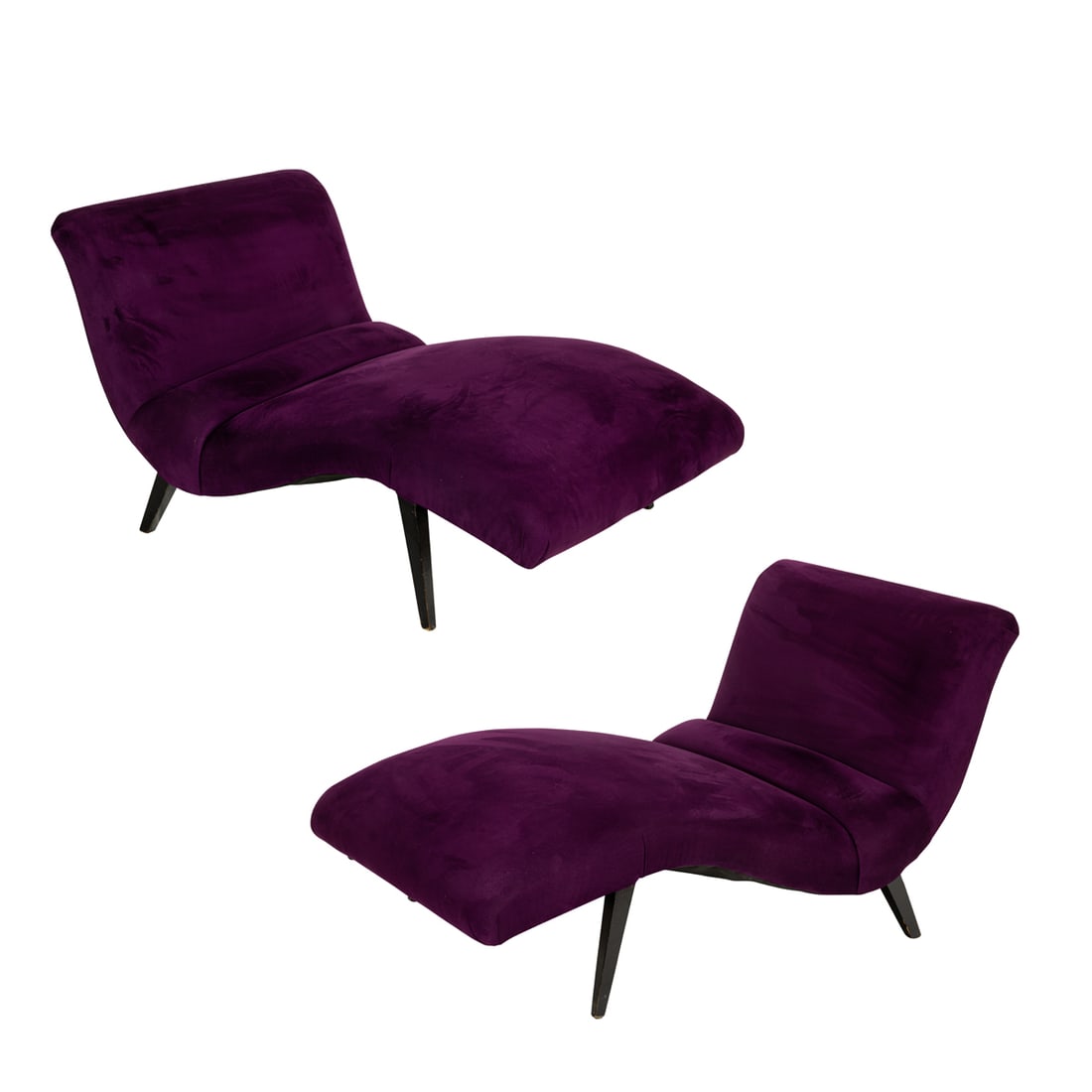 A pair of Adrian Pearsall Wave chaise longues: A pair of Adrian Pearsall Wave chaise longues, upholstered in plum velvet and raised on tapered ebonized feet, 28"h x 36"l x 56"l