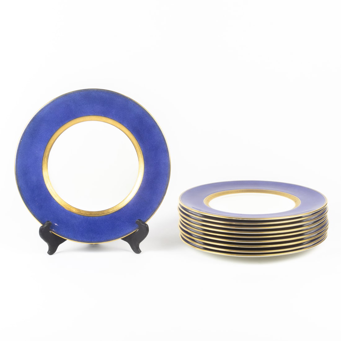 A set of ten Royal Doulton dinner plates: A set of ten Royal Doulton dinner plates, early 20th century, each with blue souffle border and gilt rims, printed factory mark, painted pattern BB81/H243, 10.5"dia. Provenance: Property of the Mitsui