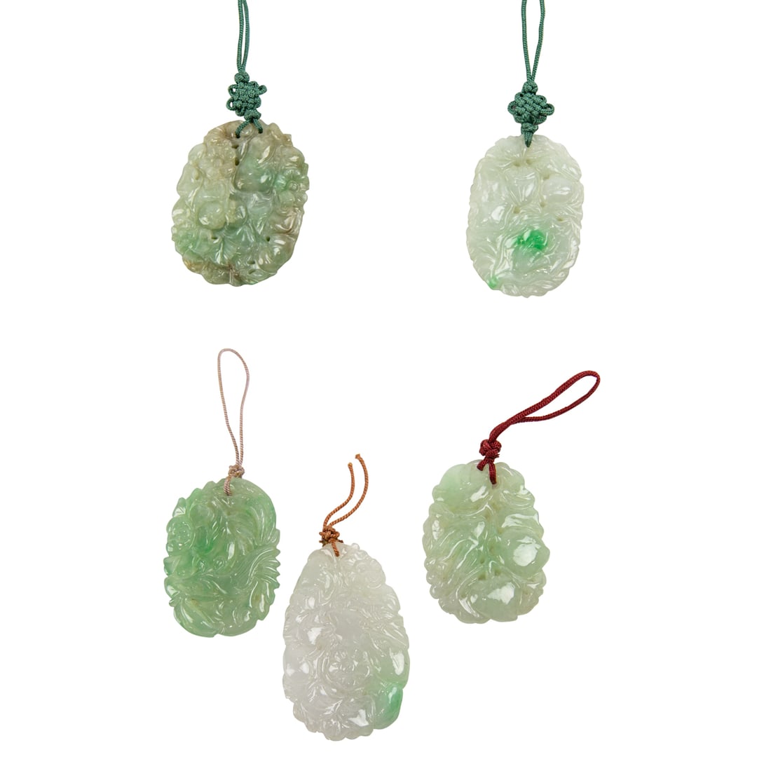 (lot of 5) Chinese jadeite pendants: (lot of 5) Chinese jadeite pendants. Featuring floral designs, from 1.75" to 2.25" across.