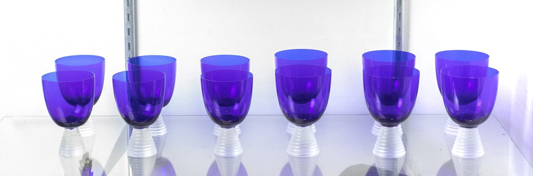 A suite of twelve Carlo Moretti Murano cobalt glass cups: A suite of twelve Carlo Moretti Murano cobalt glass cups, each cobalt cup on stepped foot, each with engraved signature, (6) goblets, 6"h and (6) wine, 4.75"h