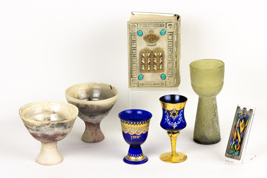 A collection of Contemporary Judaica (Jewish cermeonial objects): A collection of Contemporary Judaica (Jewish cermeonial objects), including pair of ceramic Elijah and Miriam goblets, Continental glass stemware, and artist-designed Mezuzah [7 total]