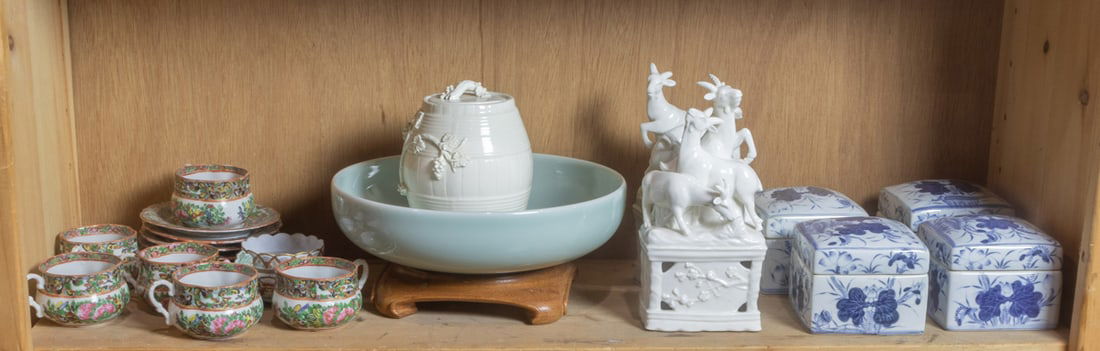 A shelf of Chinese decorative objects: A shelf of Chinese decorative objects. 10" widest.