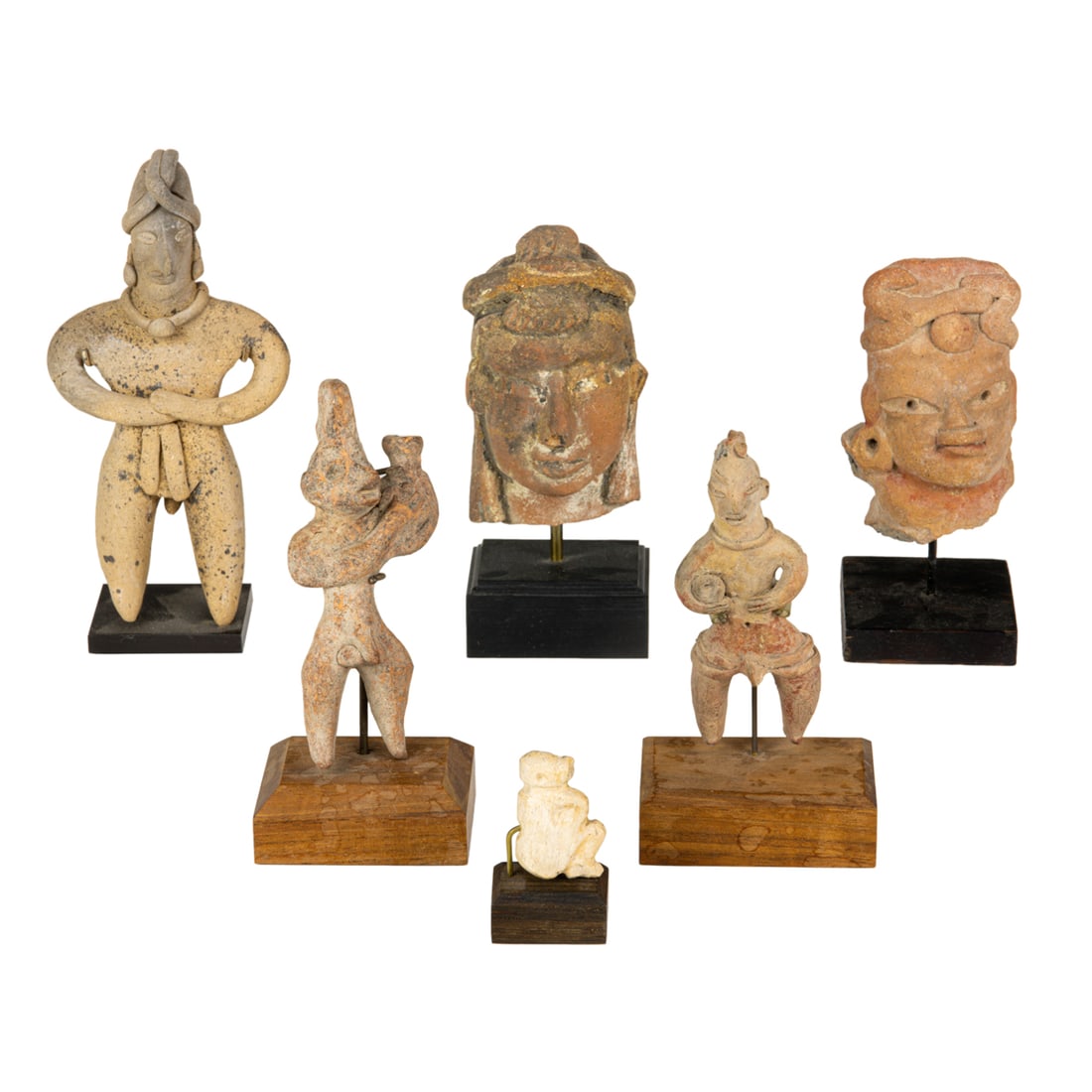 Five Pre-Columbian pottery figures or heads: Five Pre-Columbian pottery figures or heads, together with a Colima bone amulet