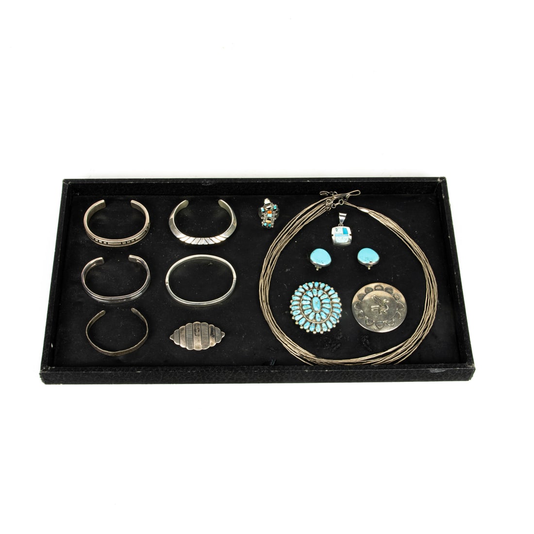 A Native American sterliing jewelry lot, including (5) cuff bracelets, most signed, including S (1 of 2)