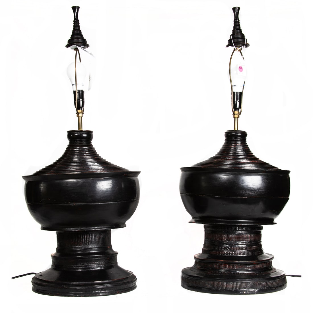 A pair of Burmese black lacquered pagoda lamps. 34" high.: A pair of Burmese black lacquered pagoda lamps. 34" high.