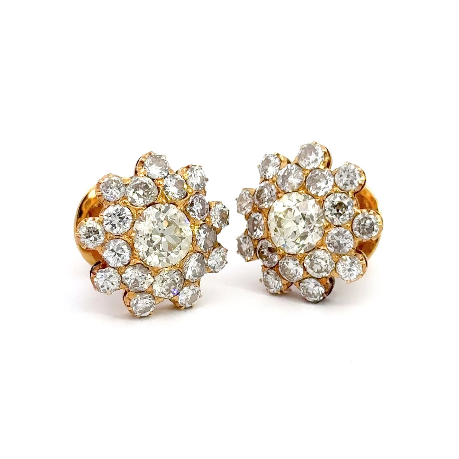 Diamond and 18k Gold Earrings: (lot of 2) Diamond and 18k Gold Earrings, 0.79"d (2 cm), gross weight 11.65 grams. Provenance: The exquisite Jewelry collection of Madame Yen Chia-Kan, the former first lady of Taiwan.