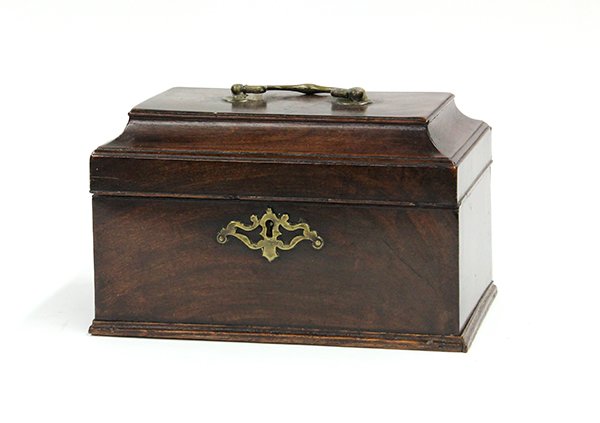 English tea caddy: English tea caddy. 19th century, of casket form, the hinged top opening to a tin lined and covered interior, and rising on a molded base, 5.5"h x 9.5"w