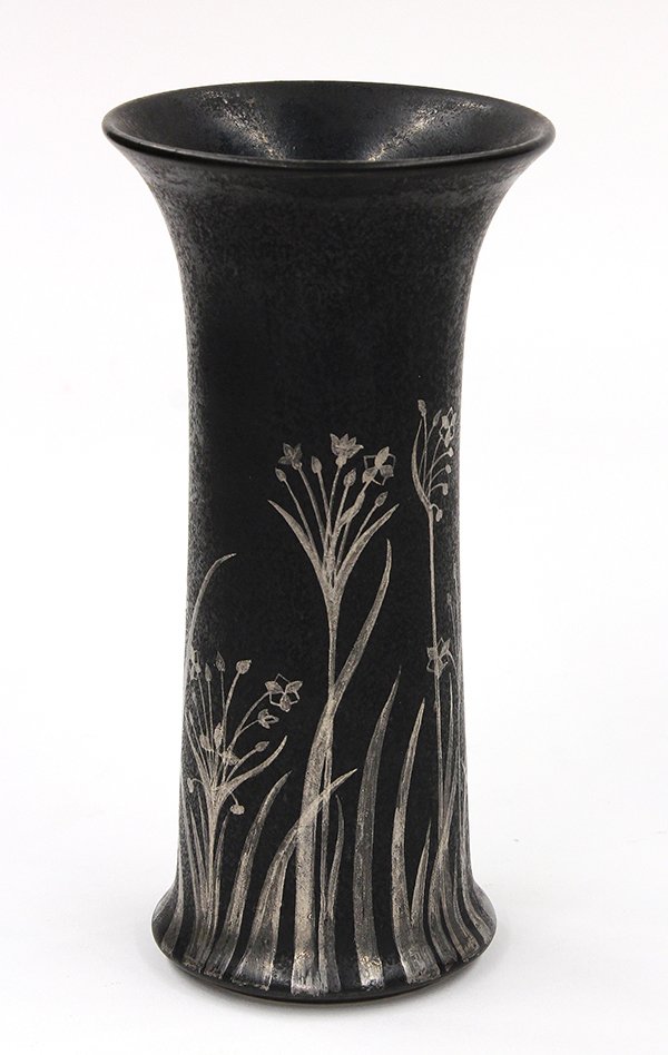English Ruskin pottery vase: English Ruskin pottery vase, executed in 1917 and having a matte black body accented with silvered floral sprays continuing to the flaring circular base, marked Ruskin England. dated 1917 and bears sc