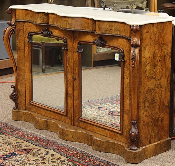 Rococo Revival walnut burl commode: Rococo Revival walnut burl commode, the shaped marble top above a two door case having mirrored panels flanked with relief carved stiles and rising on a conforming shaped base, 36''h x 54''w x 15''d (