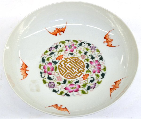 Chinese Footed Porcelain Dish: Chinese enameled footed porcelain dish, the shallow well centered with a gilt shou medallion surrounded with flowering tendrils along with five auspicious bats, above the tall foot encircled with stif