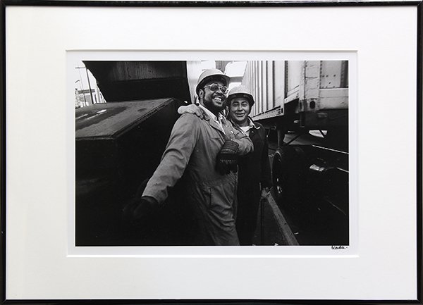 Photographs, Richard Blair, Kathleen Goodwin: (Lot of 5) Framed photographs, White Truck, Produce, A Prayer, and Work Buddies by Richard Blair (American, b. 1948), and Men at the Bus Stop, by Kathleen Goodwin, each signed lower right mount, overa