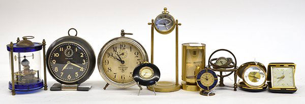 Vintage clocks including an Omega globe: (lot of 10) Vintage clocks including an Omega globe in stand, the style of a constellation and zodiac rings; Swiza Sheffield jeweled brass cylinder alarm clock with stick chapters, Westclox "Big Ben"