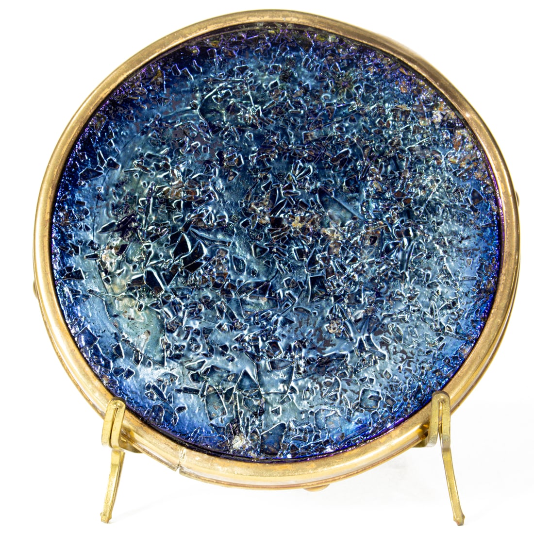A Tiffany Studios gilt bronze mounted blue Favrile glass round trivet: A Tiffany Studios gilt bronze mounted blue Favrile glass round trivet, impressed 'TIFFANY STUDIOS', 5"dia