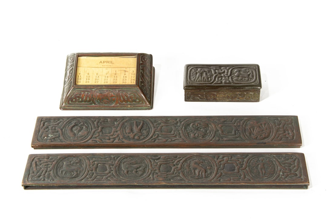 A Tiffany Studios patinated bronze partial desk set in the Zodiac pattern (1 of 7)