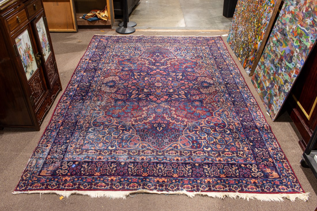 A Persian carpet (wear), 7' x 10'2": A Persian carpet (wear), 7' x 10'2"