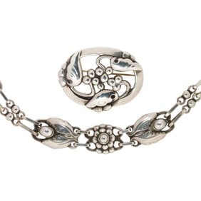 A vintage Georg Jensen brooch and necklace