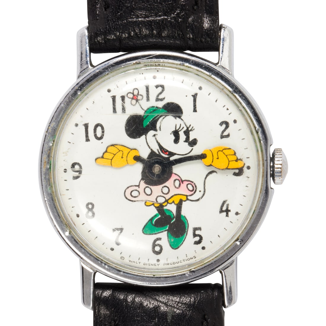 A Minnie Mouse watch: A Minnie Mouse watchfeaturing Minnie Mouse on the face, with her hands acting as the hour and minute hands; the white dial, black Arabic hours, on a black leather strap