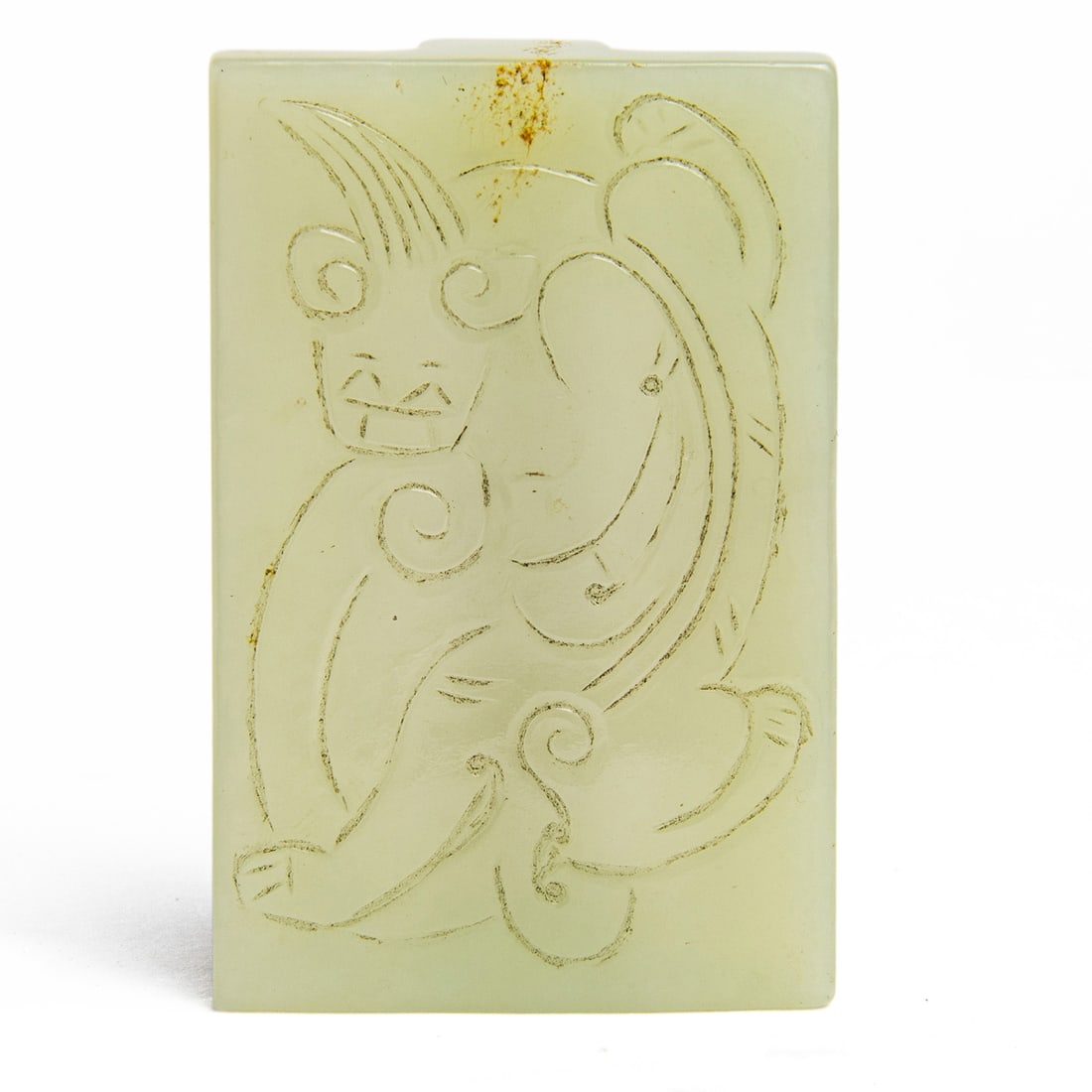 A Chinese white jade belt ornament: A Chinese white jade belt ornament. 2.375" across.