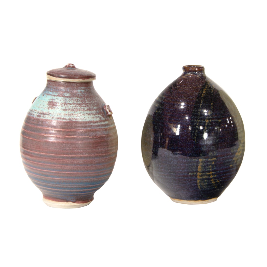 Two Otto Heino porcelain yellow glazed wheel thrown vases: Two Otto Heino porcelain yellow glazed wheel thrown vases, incised signature and date 1999, the larger 7.5"h x 6.5"dia