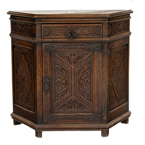 A Spanish Renaissance revival oak cabinet, circa 1860