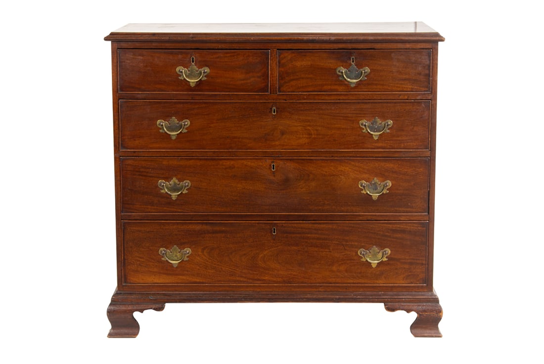 A Georgian mahogany chest of drawers: A Georgian mahogany chest of drawers, the highly figured case with five graduated drawers with later hardware, and rising on ogee bracket feet, overall 41.5"h x 45"w x 22"d