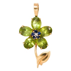 A peridot, sapphire, diamond and 18k gold pendant