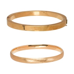 Two 14k gold bangle bracelets