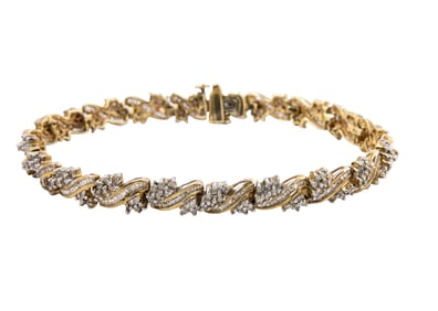 A diamond and 10k gold bracelet