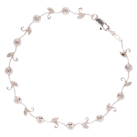 A diamond and 14k white gold bracelet