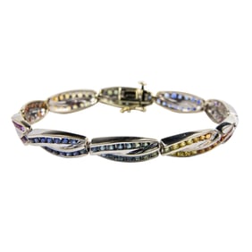A synthetic sapphire and 14k white gold bracelet