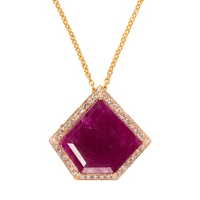 An 18k gold ruby and diamond necklace
