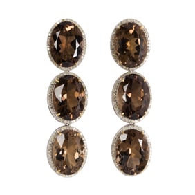 A pair of smokey quartz, diamond, silver and gold and silver earrings