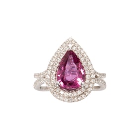 A pink sapphire, diamond and 14k white gold ring