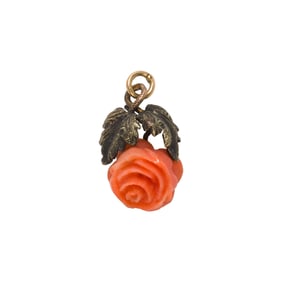 A coral and 10k gold pendant