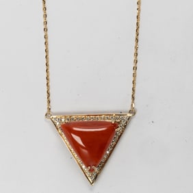 A coral, diamond and 18k gold pendant necklace