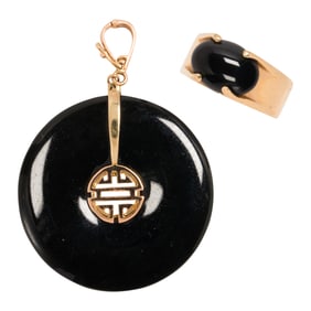 An onyx and 14k gold pendant-enhancer and ring