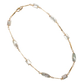 A mother-of-pearl and 18k gold necklace