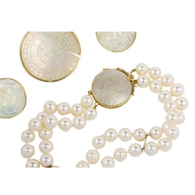 A group of pearl, mother of pearl and 14k gold jewelry