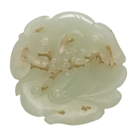 A Chinese white jade lion and phoenix pendant