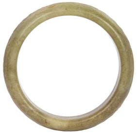 A Chinese celadon jade bangle