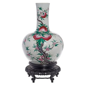A Chinese famille rose 'peach' vase with stand