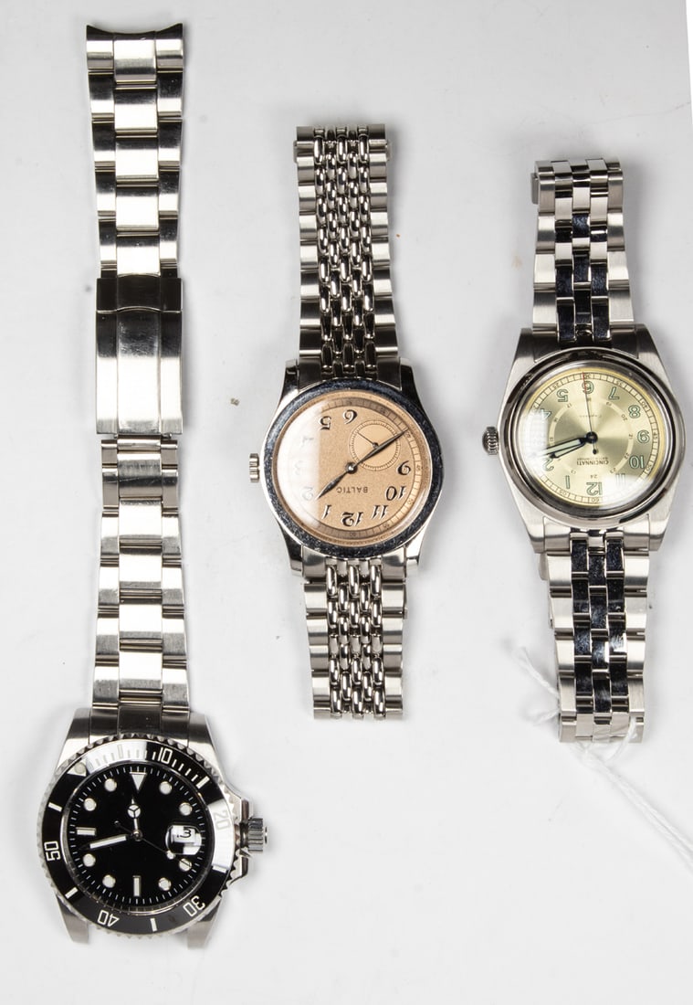 A group of three wristwatches (1 of 1)