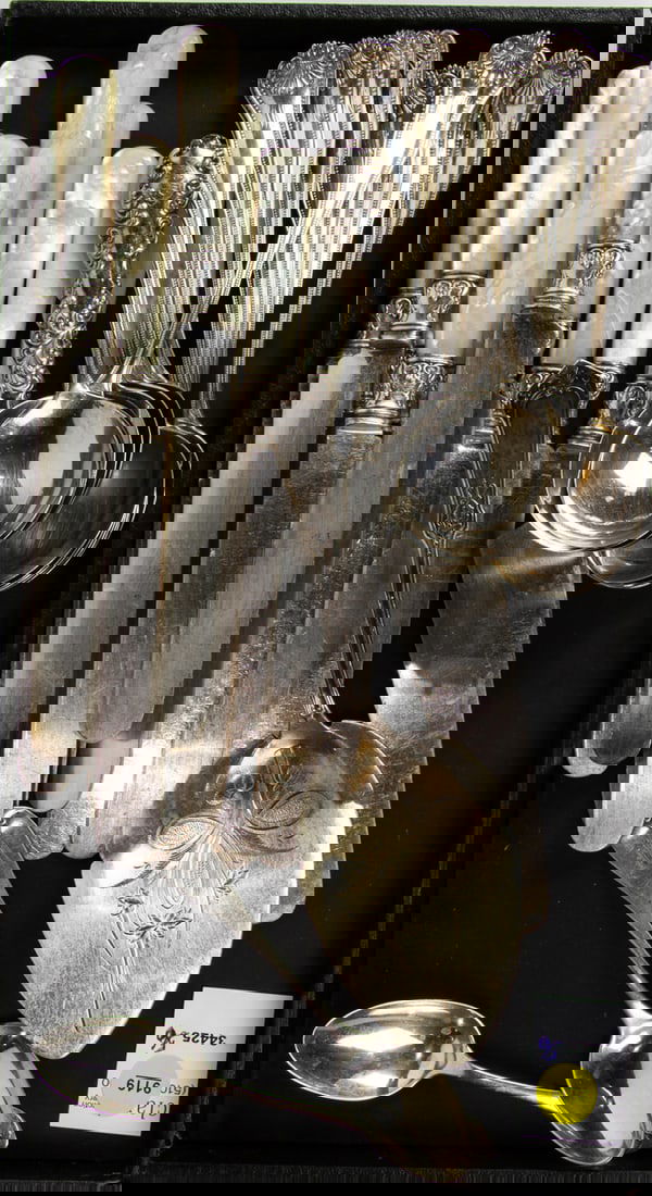 A lot of sterling and sterling mounted flatware lot: A lot of sterling and sterling mounted flatware lot, including (12) Frank Smith soup spoons 7"l; (10) mother of pearl knives 9.5"l; a Wood & Hughes Humboldt pie server 18.7 ozt [26 total]