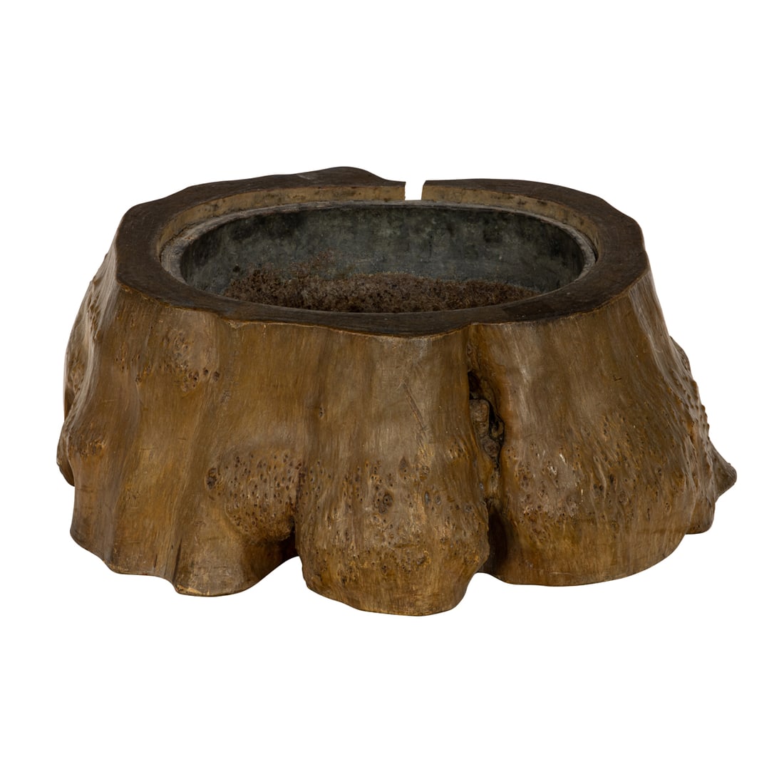 A Studio wood low jardiniere: A Studio wood low jardiniere, composed of a natural tree trunk section inset with metal liner, 10"h x approximately 27" x 27"