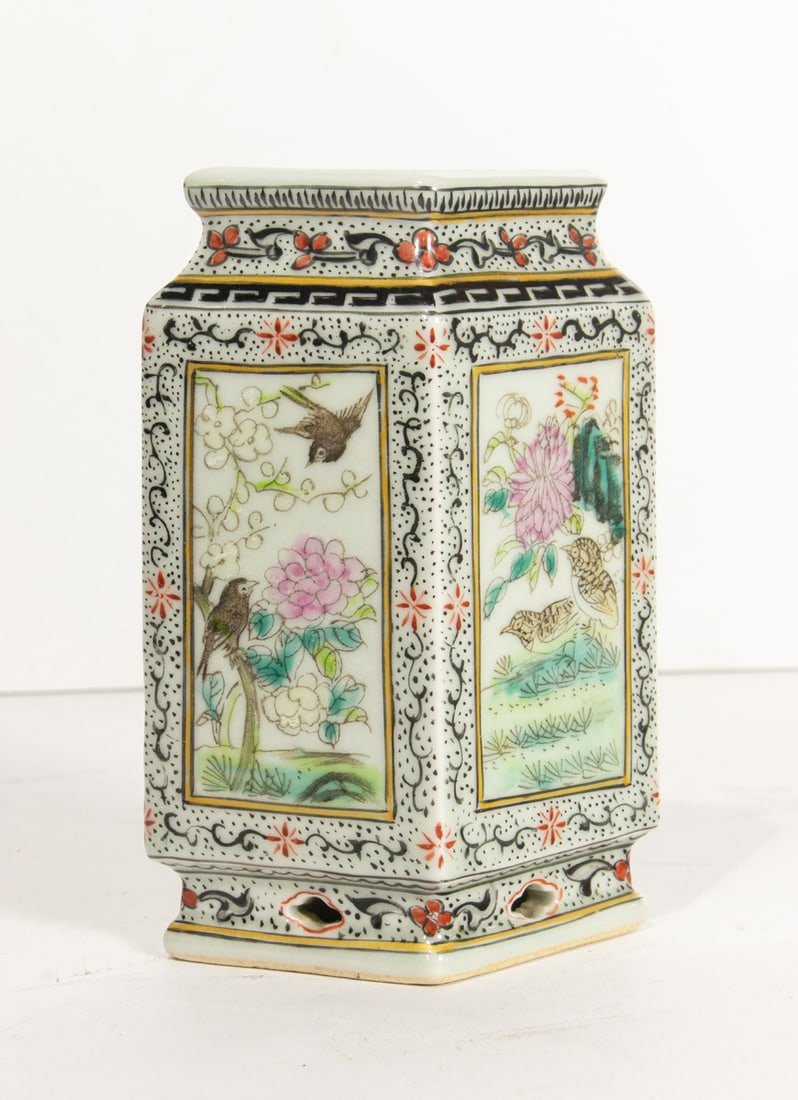 A Chinese famille rose vase: A Chinese famille rose vase. Featuring birds and flowers in four shaped panels, Yanghe Tangzhi four-character, Republic period, 4.75" high.
